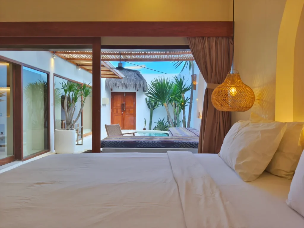 Second bedroom with pool view in the two-bedroom villa for sale in Kuta, South Lombok