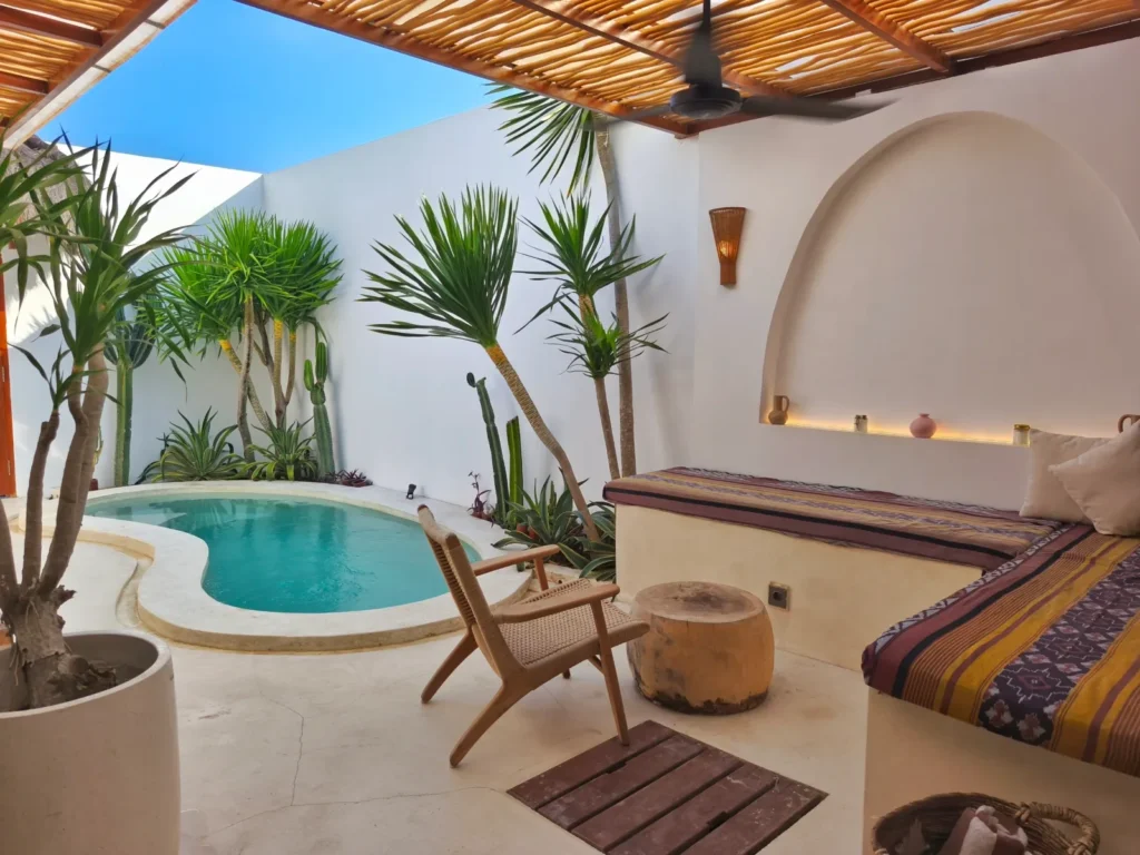 Outdoor lounge and private pool of the built villa for sale in Kuta, South Lombok