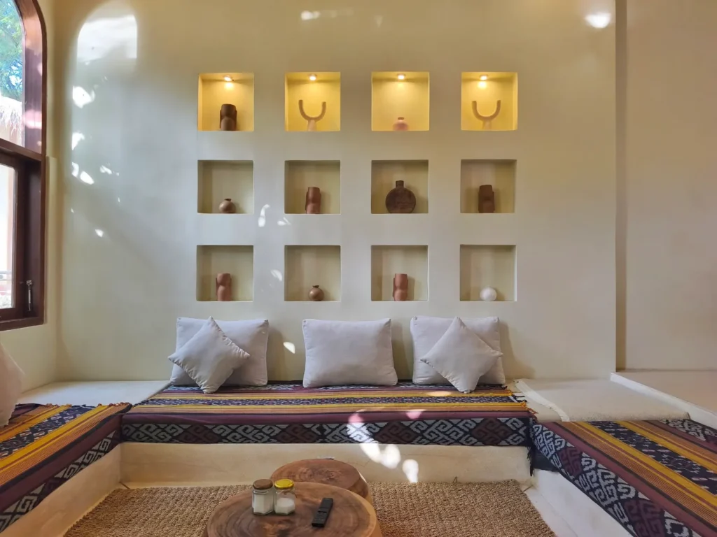 Sunken couch in the living room of the built villa for sale in Kuta, South Lombok